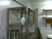 Shelve with the addition of hanging utensils